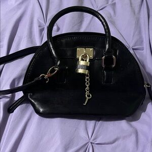 Elegant Black Handbag with Lock Detail